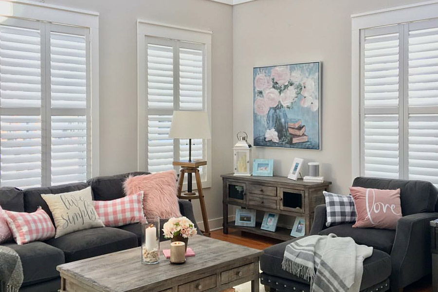 White Polywood shutters on living room windows